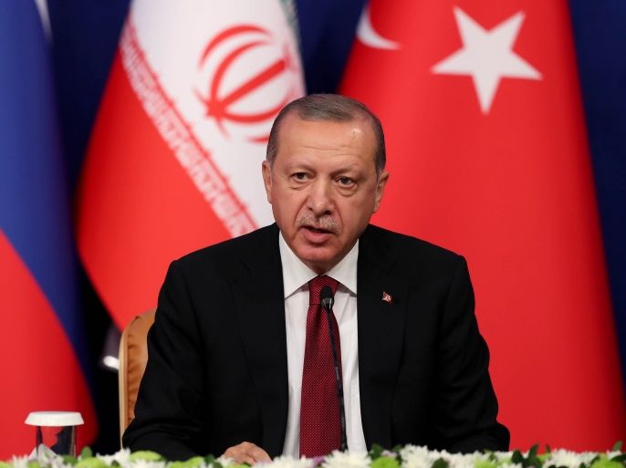 Turkey - Iran - Russia trilateral summit in Tehran- - TEHRAN, IRAN - SEPTEMBER 7: President of Turkey Recep Tayyip Erdogan speaks during a joint press conference held with President of Iran Hassan Rouhani (not seen) and President of Russia Vladimir Putin (not seen) after a trilateral summit between Turkey, Iran and Russia on September 7, 2018 in Tehran, Iran.
