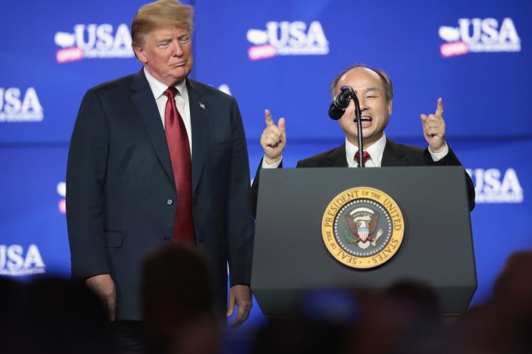 MT PLEASANT, WI - JUNE 28: President Donald Trump (L) and Masayoshi Son, founder and chief executive officer of SoftBank, participate in a groundbreaking ceremony for the $10 billion Foxconn factory complex on June 28, 2018 in Mt. Pleasant, Wisconsin. Foxconn, a Taiwanese electronics manufacturer that currently builds Apple iPhones, Amazon Kindles and Echo Dots at their factories in China will manufacture LCD screens at the Wisconsin facility. The facility is expected t