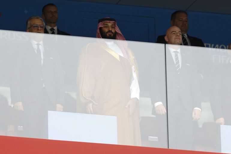 Russia v Saudi Arabia: Group A - 2018 FIFA World Cup Russia- - MOSCOW, RUSSIA - JUNE 14: Mohammed bin Salman of Saudi Arabia (2nd L), FIFA President Gianni Infantino (3rd L) and Russian President Vladimir Putin (3rd R) look on during the 2018 FIFA World Cup Russia Group A match between Russia and Saudi Arabia at Luzhniki Stadium on June 14, 2018 in Moscow, Russia.