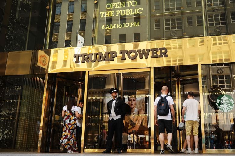 NEW YORK, NY - AUGUST 24: A guard stands outside of Trump Tower on Fifth Avenue in Manhattan on August 24, 2018 in New York City. Following new allegations over hush money that former Trump attorney Michael Cohen paid to an adult-film actress, the Manhattan district attorneyÕs office in New York City may seek criminal charges against the Trump Organization in the coming days. Spencer Platt/Getty Images/AFP== FOR NEWSPAPERS, INTERNET, TELCOS & TELEVISION USE ONLY ==