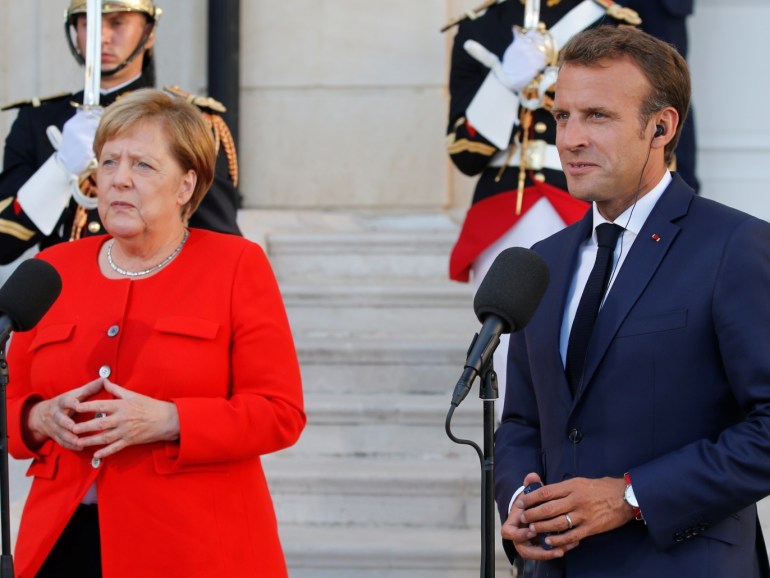 French President Emmanuel Macron and German Chancellor Angela Merkel talk to the media before a meeting at the Pharo Palace in Marseille, France, September 7, 2018. REUTERS/Jean-Paul Pelissier