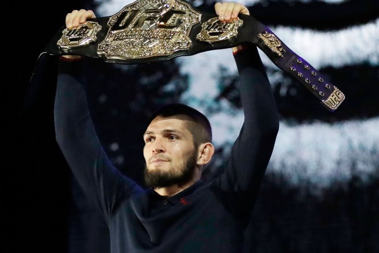 LAS VEGAS, NV - OCTOBER 04: UFC lightweight champion Khabib Nurmagomedov poses for cameras during a press conference for UFC 229 at Park Theater at Park MGM on October 04, 2018 in Las Vegas, Nevada. Nurmagomedov will defend his title against Conor McGregor at UFC 229 on October 6 at T-Mobile Arena in Las Vegas, Nevada. Isaac Brekken/Getty Images/AFP== FOR NEWSPAPERS, INTERNET, TELCOS & TELEVISION USE ONLY ==