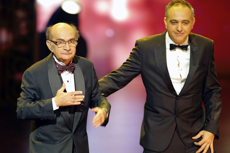 epa07180474 Film producer Mohamed Hefzy (R) amd Director Youssef Chreif Rez Allah (L) during the opening ceremony of the 40th Cairo International Film Festival (CIFF), in Cairo, Egypt, 20 November 2018. The CIFF runs from 20 to 29 November. EPA-EFE/KHALED ELFIQI