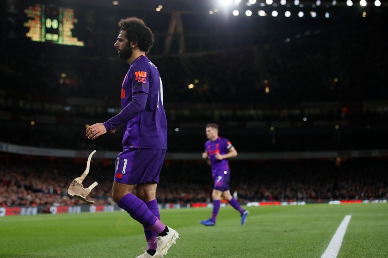 Soccer Football - Premier League - Arsenal v Liverpool - Emirates Stadium, London, Britain - November 3, 2018 Liverpool's Mohamed Salah removes his wrist support during the match REUTERS/David Klein EDITORIAL USE ONLY. No use with unauthorized audio, video, data, fixture lists, club/league logos or