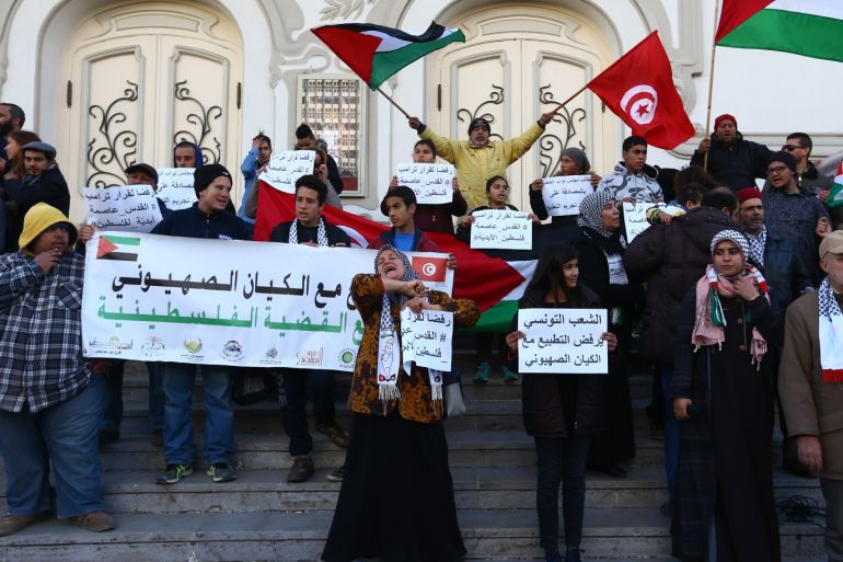 Tunisians protest against Israel- - TUNIS, TUNISIA - DECEMBER 23: Demonstrators at Habib Burgiba Street shout slogans during a demonstration in support of a proposed law that would consider relations with Israel as a crime, in Tunis, Tunisia on December 23, 2017.