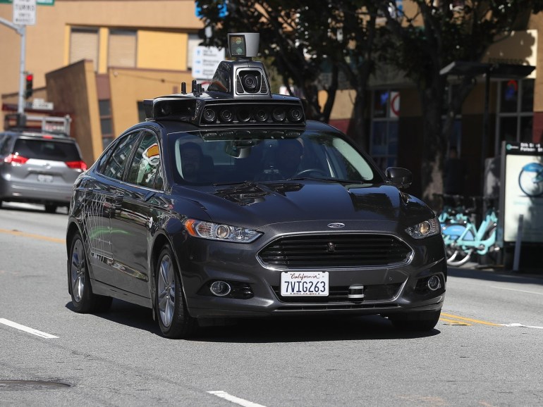 SAN FRANCISCO, CA - MARCH 28: An Uber self-driving car drives down 5th Street on March 28, 2017 in San Francisco, California. Cars in Uber's self-driving cars are back on the roads after the program was temporarily halted following a crash in Tempe, Arizona on Friday. Justin Sullivan/Getty Images/AFP== FOR NEWSPAPERS, INTERNET, TELCOS & TELEVISION USE ONLY ==