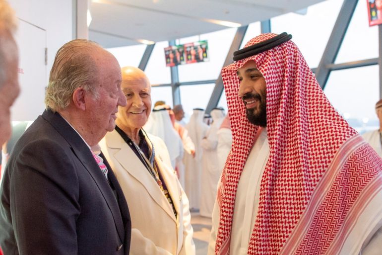 Saudi Crown Prince Mohammed bin Salman speaks with former Spanish King Juan Carlos during the Emirates Formula One Grand Prix at the Yas Marina racetrack in Abu Dhabi, United Arab Emirates November 25, 2018. Bandar Algaloud/Courtesy of Saudi Royal Court/Handout via REUTERS ATTENTION EDITORS - THIS PICTURE WAS PROVIDED BY A THIRD PARTY.
