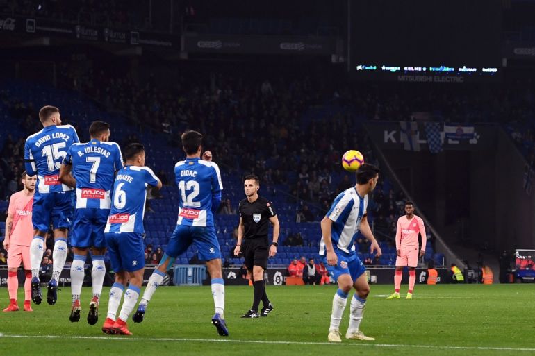 BARCELONA, SPAIN - DECEMBER 08: Lionel Messi of Barcelona scores his team's fourth goal during the La Liga match between RCD Espanyol and FC Barcelona at RCDE Stadium on December 8, 2018 in Barcelona, Spain. (Photo by Alex Caparros/Getty Images)