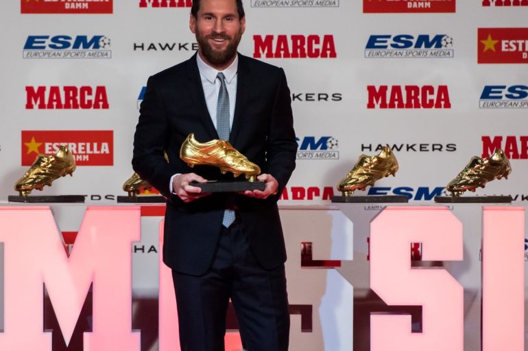BARCELONA, SPAIN - DECEMBER 18: Lionel Messi of FC Barcelona poses with his five European Golden Shoe awards after receiving the 2017-18 Season European Golden Shoe award for Europe's top scorer for the fifth time during the Golden Shoe Award Ceremony on December 18, 2018 in Barcelona, Spain. (Photo by Alex Caparros/Getty Images)