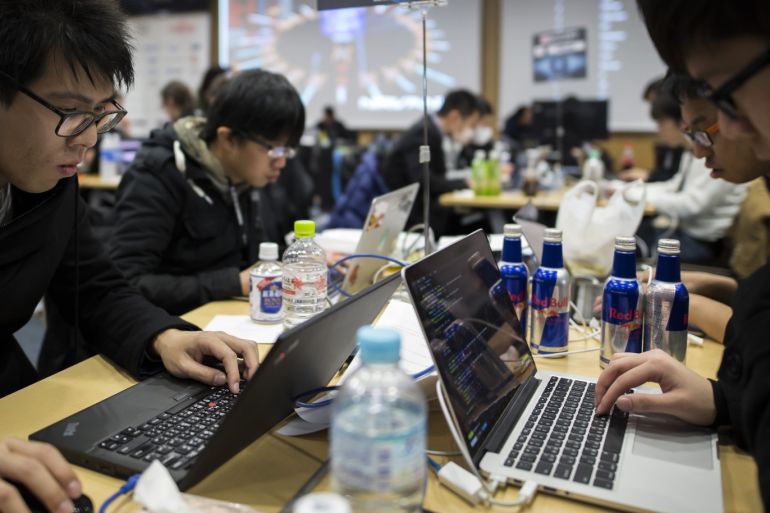 TOKYO, JAPAN - JANUARY 28: Participants use laptop computers as they take part in the Seccon 2016 final competition on January 28, 2017 in Tokyo, Japan. 24 teams from Japan, the US, China, Taiwan, South Korea, Russia, Poland, Switzerland and France competed their skills for cyber securities at the final round of the international cyber security contest in Tokyo. (Photo by Tomohiro Ohsumi/Getty Images)