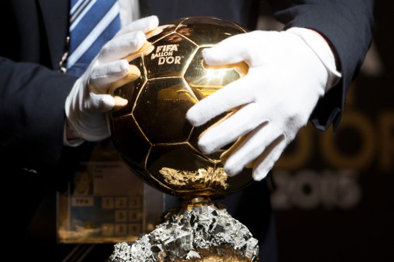 ZURICH, SWITZERLAND - JANUARY 11: A volunteer places the FIFA Ballon d'Or trophy on a display for a press conference prior to the FIFA Ballon d'Or Gala 2015 at the Kongresshaus on January 11, 2016 in Zurich, Switzerland. (Photo by Philipp Schmidli/Getty Images)