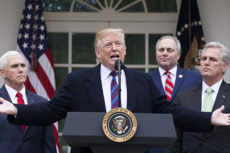 epaselect epa07262474 US President Donald J. Trump (C) holds a news conference beside US Vice President Mike Pence (L), Republican Representative from Louisiana Steve Scalise (2-R) and House Minority Leader Republican Kevin McCarthy (R) in the Rose Garden of the White House in Washington, DC, USA, 04 January 2019. President Trump discussed a variety of topics, particularly his meeting with Congressional Democratic and Republican leaders for negotiations on the ongoing p