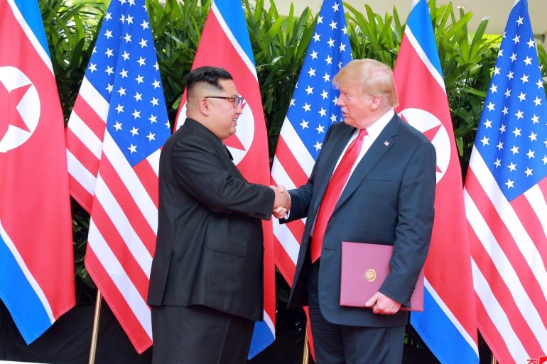 U.S. President Donald Trump shakes hands with North Korean leader Kim Jong Un at the Capella Hotel on Sentosa island in Singapore in this picture released on June 12, 2018 by North Korea's Korean Central News Agency. KCNA via REUTERS ATTENTION EDITORS - THIS PICTURE WAS PROVIDED BY A THIRD PARTY. REUTERS IS UNABLE TO INDEPENDENTLY VERIFY THE AUTHENTICITY, CONTENT, LOCATION OR DATE OF THIS IMAGE. NO THIRD PARTY SALES. NOT FOR USE BY REUTERS THIRD PARTY DISTRIBUTORS. SOU