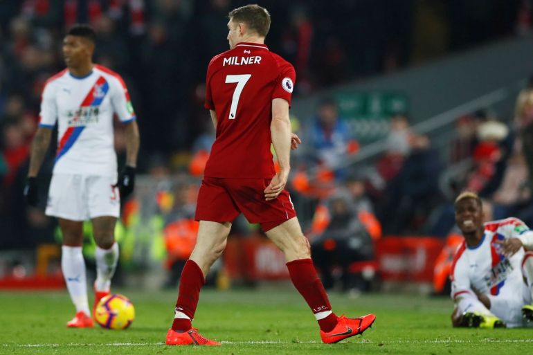 Soccer Football - Premier League - Liverpool v Crystal Palace - Anfield, Liverpool, Britain - January 19, 2019 Liverpool's James Milner walks off as he is shown a red card by referee Jonathan Moss (not pictured) after fouling Crystal Palace's Wilfried Zaha Action Images via Reuters/Jason Cairnduff EDITORIAL USE ONLY. No use with unauthorized audio, video, data, fixture lists, club/league logos or