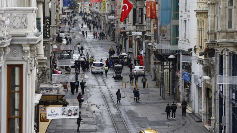 Pedestrians walk along Istiklal street, a major shopping and tourist district, in central Istanbul, Turkey March 20, 2016, a day after a suicide bomb attack. REUTERS/Osman Orsal