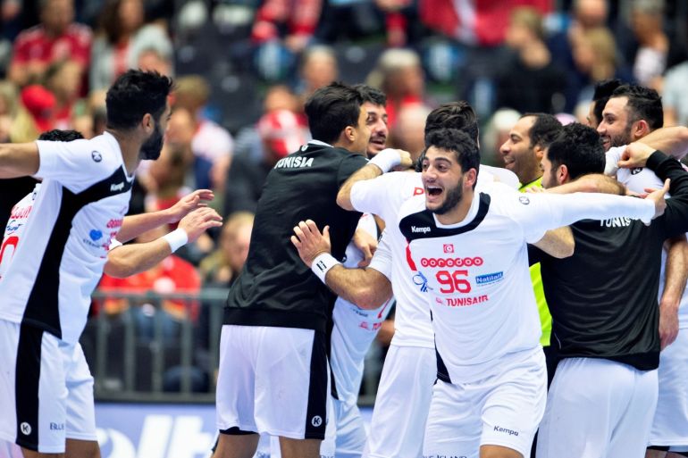 IHF Handball World Championship - Germany & Denmark 2019 - Group C - Austria v Tunisia - Herning, Denmark - January 17, 2019. Tunisia's players celebrate their victory. Ritzau Scanpix/Henning Bagger via REUTERS ATTENTION EDITORS - THIS IMAGE WAS PROVIDED BY A THIRD PARTY. DENMARK OUT.