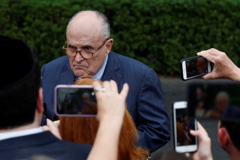 Rudy Giuliani, attorney for U.S. President Donald Trump, gives an impromptu news conference following the White House Sports and Fitness Day event on the South Lawn of the White House in Washington, U.S., May 30, 2018. REUTERS/Leah Millis