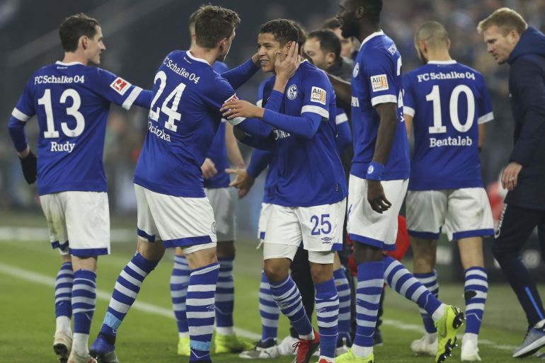 GELSENKIRCHEN, GERMANY - NOVEMBER 24: Amine Harit of Schalke celebrates with teammates after scoring his team's second goal during the Bundesliga match between FC Schalke 04 and 1. FC Nuernberg at Veltins-Arena on November 24, 2018 in Gelsenkirchen, Germany. (Photo by Maja Hitij/Bongarts/Getty Images)