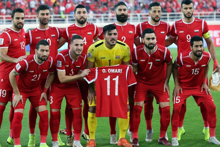 epa07273111 The starting eleven of Syria poses for a team picture before the 2019 AFC Asian Cup group B preliminary round match between Jordan and Syria in Al Ain, United Arab Emirates, 10 January 2019. EPA-EFE/MAHMOUD KHALED