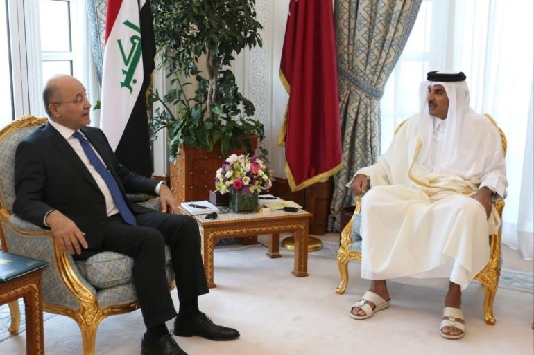 Amir of Qatar Sheikh Tamim bin Hamad bin Khalifa Al-Thani meets with Iraq's President Barham Saleh in Doha, Qatar January 10, 2019. The Presidency of the Republic of Iraq Office/Handout via REUTERS ATTENTION EDITORS - THIS IMAGE WAS PROVIDED BY A THIRD PARTY.