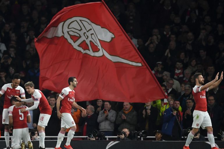LONDON, ENGLAND - FEBRUARY 21: Sokratis Papastathopoulos of Arsenal celebrates with teammates after scoring his team's third goal during the UEFA Europa League Round of 32 Second Leg match between Arsenal and BATE Borisov at Emirates Stadium on February 21, 2019 in London, United Kingdom. (Photo by Mike Hewitt/Getty Images)