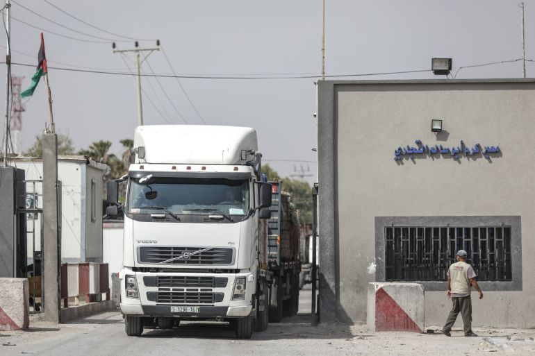 Israel partially closes Karam Abu Salem crossing- - GAZA CITY, GAZA - JULY 17 : A truck crosses at the commercial border crossing Karam Abu Salem after Israel closed the crossing, except for food and mecidine goods, in Gaza City, Gaza on July 17, 2018. Only medicines and food will be allowed for entry at Karam Abu Salem, Gaza's only commercial crossing.