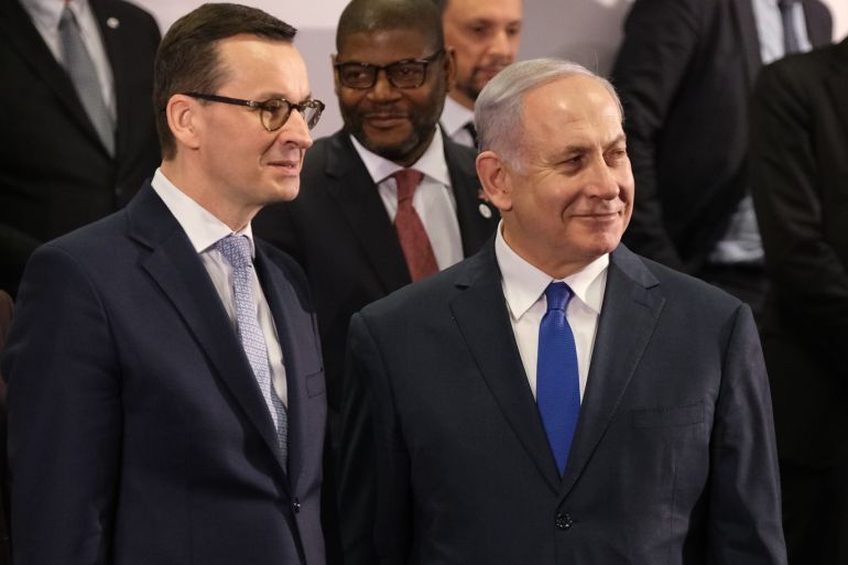 WARSAW, POLAND - FEBRUARY 14: Polish Prime Minister Mateusz Morawiecki (L) and Israeli Prime Minister Benjamin Netanyahu attend the group photo at the Ministerial to Promote a Future of Peace and Security in the Middle East on February 14, 2019 in Warsaw, Poland. The ministerial is a conference on the Middle East sponsored by the Polish and U.S. governments. Many European countries are only sending junior representatives or leaving the two-day conference early as E.U. and U.S. policies towards the Middle East and Iran have increasingly diverged since the Trump administration took power. (Photo by Sean Gallup/Getty Images)