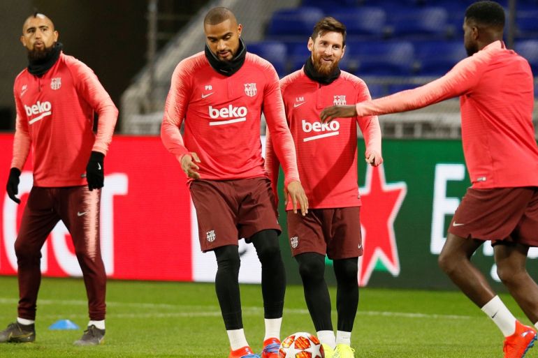 Soccer Football - Champions League - FC Barcelona Training - Groupama Stadium, Lyon, France - February 18, 2019 Barcelona's Lionel Messi, Kevin-Prince Boateng and team mates during training REUTERS/Emmanuel Foudrot