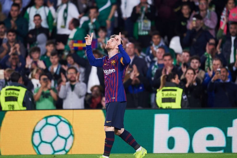 SEVILLE, SPAIN - MARCH 17: Lionel Messi of FC Barcelona celebrates after scoring his team's fourth goal during the La Liga match between Real Betis Balompie and FC Barcelona at Estadio Benito Villamarin on March 17, 2019 in Seville, Spain. (Photo by Aitor Alcalde/Getty Images)