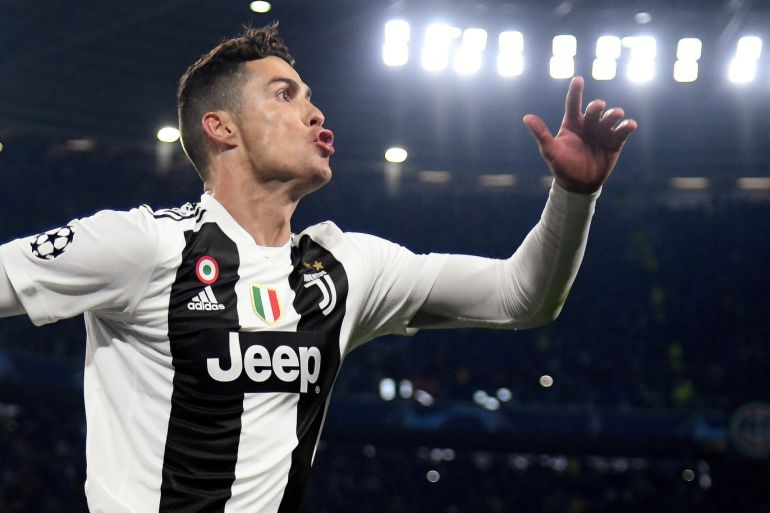 Soccer Football - Champions League - Round of 16 Second Leg - Juventus v Atletico Madrid - Allianz Stadium, Turin, Italy - March 12, 2019 Juventus' Cristiano Ronaldo celebrates scoring their third goal to complete his hat-trick REUTERS/Alberto Lingria TPX IMAGES OF THE DAY