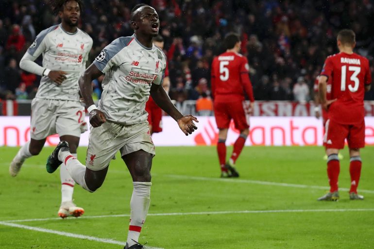 MUNICH, GERMANY - MARCH 13: Sadio Mane of Liverpool celebrates as he scores his team's third goal during the UEFA Champions League Round of 16 Second Leg match between FC Bayern Muenchen and Liverpool at Allianz Arena on March 13, 2019 in Munich, Bavaria. (Photo by Alex Grimm/Bongarts/Getty Images)