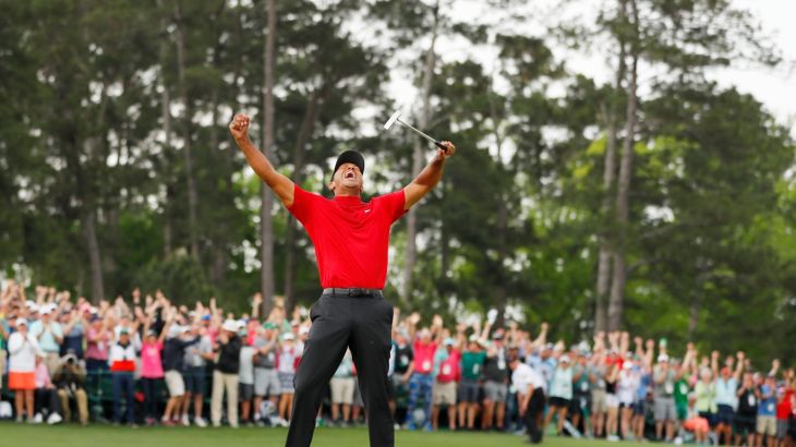 AUGUSTA, GEORGIA - APRIL 14: (Sequence frame 8 of 12) Tiger Woods of the United States celebrates after making his putt on the 18th green to win the Masters at Augusta National Golf Club on April 14, 2019 in Augusta, Georgia. Kevin C. Cox/Getty Images/AFP== FOR NEWSPAPERS, INTERNET, TELCOS & TELEVISION USE ONLY ==