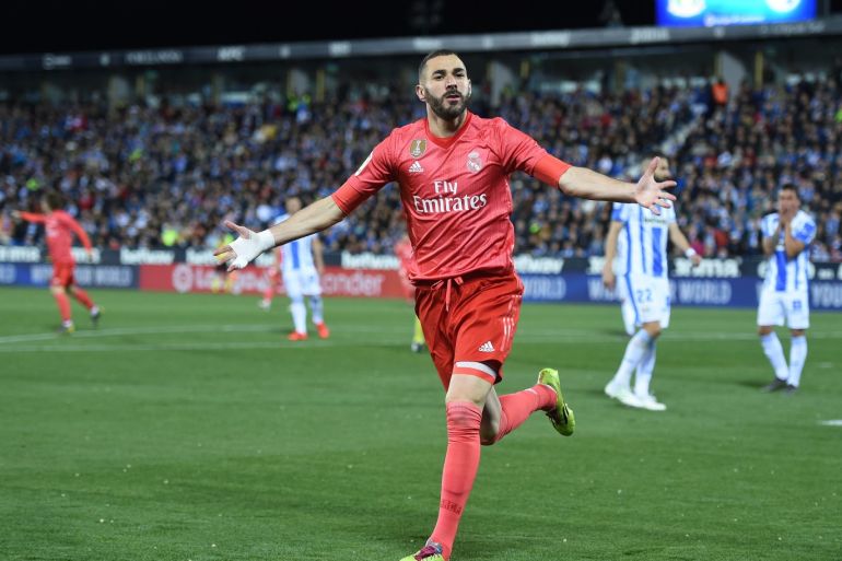 LEGANES, SPAIN - APRIL 15: Karim Benzema of Real Madrid celebrates scoring their first goal during the La Liga match between CD Leganes and Real Madrid CF at Estadio Municipal de Butarque on April 15, 2019 in Leganes, Spain. (Photo by Denis Doyle/Getty Images)