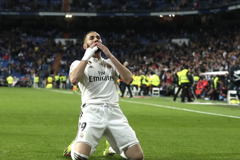 MADRID, SPAIN - MARCH 31: Karim Benzema of Real Madrid celebrates after scoring his sides third goal during the La Liga match between Real Madrid CF and SD Huesca at Estadio Santiago Bernabeu on March 31, 2019 in Madrid, Spain. (Photo by Gonzalo Arroyo Moreno/Getty Images)