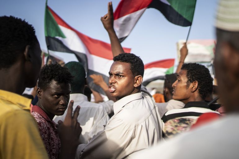 KHARTOUM, SUDAN - APRIL 27: Protestors arrive in the main gathering point to protest against the military junta on April 27, 2019 in Khartoum, Sudan. After months of protesting from the people of Sudan, organised by the Sudanese Professionals' Association (SPA), President Omar al-Bashir was ousted having been in power since 1989. The following day they also forced his successor, Awad Ibn Auf, to step down. The SPA and the people have organised a sit in at the Ministry of Defence calling for the