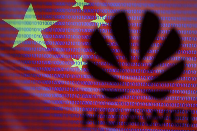 A 3-D printed Huawei logo is seen in front of displayed flag of China and cyber code in this illustration, taken February 12, 2019. REUTERS/Dado Ruvic