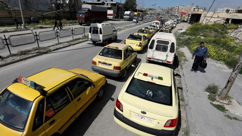 Cars stand in line at a gasoline station as they wait to fuel up in Aleppo, Syria April 11, 2019. Picture taken April 11, 2019. REUTERS/Omar Sanadiki