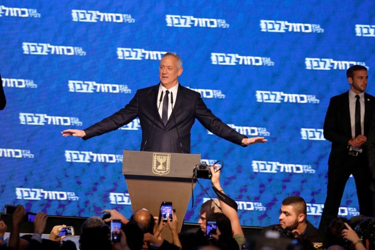 Benny Gantz, head of Blue and White party, gestures as he delivers a speech following the announcement of exit polls in Israel's parliamentary election at his party headquarters in Tel Aviv, Israel April 10, 2019. REUTERS/Amir Cohen