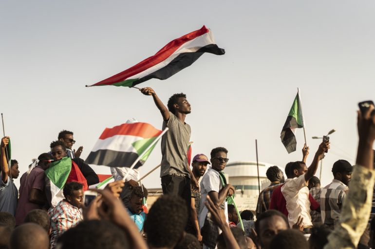 KHARTOUM, SUDAN - APRIL 27: Protestors arrive in the main gathering point to protest against the military junta on April 27, 2019 in Khartoum, Sudan. After months of protesting from the people of Sudan, organised by the Sudanese Professionals' Association (SPA), President Omar al-Bashir was ousted having been in power since 1989. The following day they also forced his successor, Awad Ibn Auf, to step down. The SPA and the people have organised a sit in at the Ministry