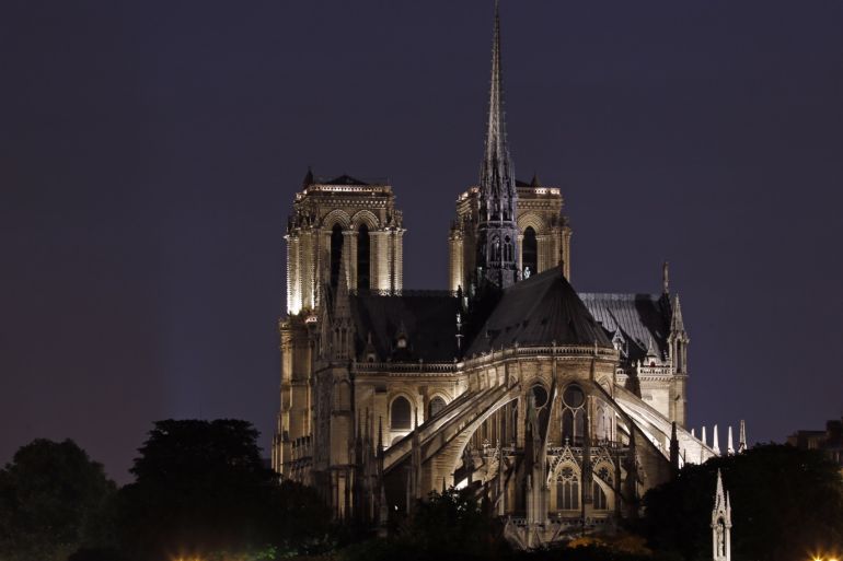 The Notre-Dame de Paris cathedral is illuminated in Paris July 15, 2013. REUTERS/Benoit Tessier (FRANCE - Tags: SOCIETY TRAVEL CITYSCAPE RELIGION)