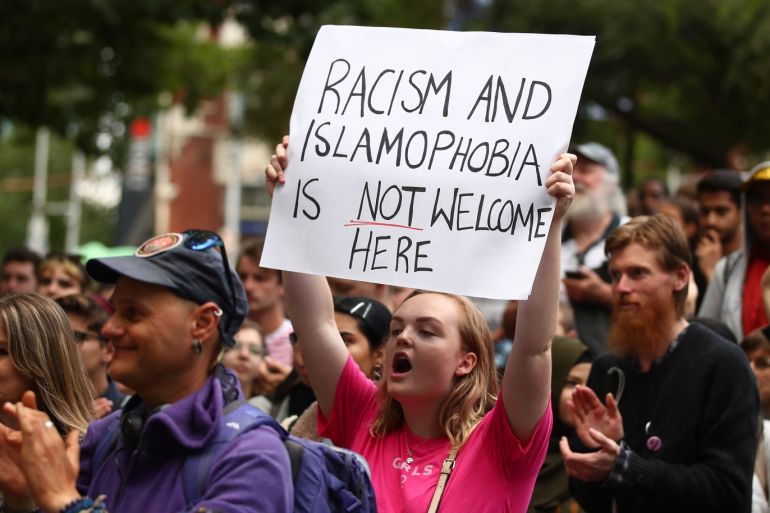 MELBOURNE, AUSTRALIA - MARCH 19: Protesters hold placards aloft as they march during the Stand Against Racism and Islamophobia: Fraser Anning Resign! rally on March 19, 2019 in Melbourne, Australia. The protesters are calling for the resignation of Senator Fraser Anning, following the statement he issued within hours of the Christchurch terror attacks on Friday 15 March, linking the shootings at two mosques to immigration. Those attacks killed 50 people and have left do