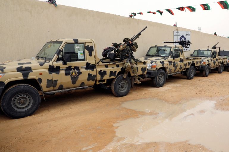 A member of pro-internationally recognised government forces checks the confiscated military vehicles from Libyan commander Khalifa Haftar's troops, in Zawiyah west of Tripoli, Libya April 5, 2019. REUTERS/Hani Amara