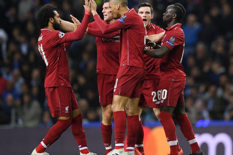PORTO, PORTUGAL - APRIL 17: Sadio Mane (right) of Liverpool celebrates with his teammates after scoring his team's first goal during the UEFA Champions League Quarter Final second leg match between Porto and Liverpool at Estadio do Dragao on April 17, 2019 in Porto, Portugal. (Photo by Matthias Hangst/Getty Images)