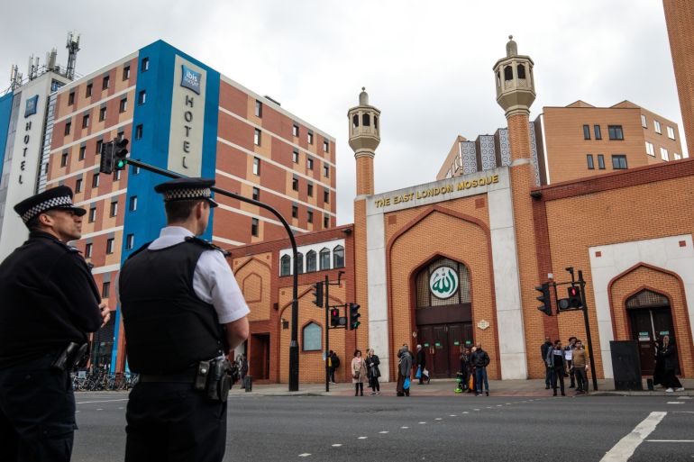 LONDON, ENGLAND - MARCH 15: Police officers stand on patrol outside the East London Mosque on March 15, 2019 in London, England. Patrols have been increased after 49 people were killed in mass shootings at two mosques in central Christchurch, New Zealand, on Friday. (Photo by Jack Taylor/Getty Images)