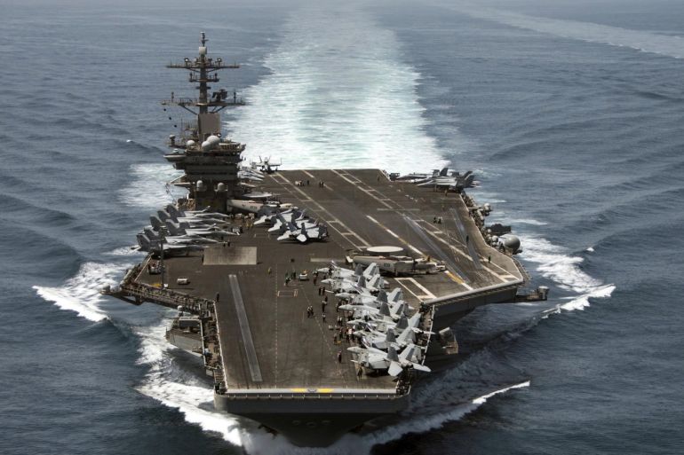 The aircraft carrier USS Theodore Roosevelt (CVN 71) operates in the Arabian Sea conducting maritime security operations in this U.S. Navy photo taken April 21, 2015. The Roosevelt and its escort ship the guided-missile cruiser USS Normandy (CG 60) will join seven other U.S. warships in the waters near Yemen, which is torn by civil strife as Iranian-backed Houthi rebels battle forces loyal to the U.S.-backed president.  REUTERS/U.S. Navy/Mass Communication Specialist 3rd Class Anthony N. Hilkowski/Handout THIS IMAGE HAS BEEN SUPPLIED BY A THIRD PARTY. IT IS DISTRIBUTED, EXACTLY AS RECEIVED BY REUTERS, AS A SERVICE TO CLIENTS. FOR EDITORIAL USE ONLY. NOT FOR SALE FOR MARKETING OR ADVERTISING CAMPAIGNS