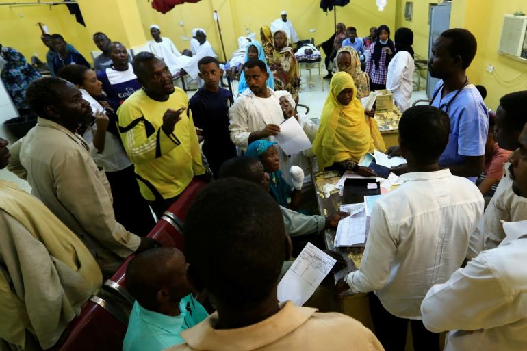 Relatives of victims of violence in the crackdown on Sudanese protesters listen to a doctor inside a ward in a hospital in Omdurman, Khartoum, Sudan June 10, 2019. REUTERS/Mohamed Nureldin Abdallah