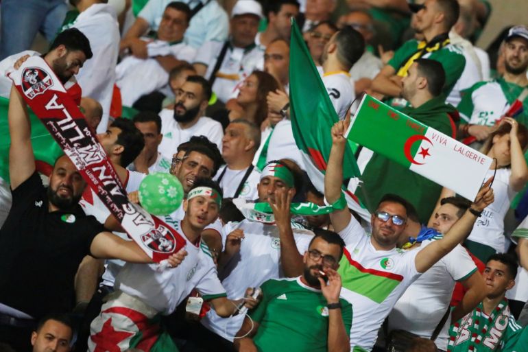 Soccer Football - Africa Cup of Nations 2019 - Group C - Algeria v Kenya - 30 June Stadium, Cairo, Egypt - June 23, 2019 Algeria fans with scarves inside the stadium before the match REUTERS/Amr Abdallah Dalsh