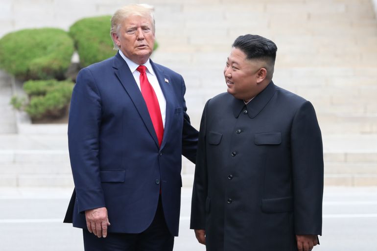 epa07683953 US President Donald J. Trump (L) talks with North Korean leader Kim Jong-un after crossing the Military Demarcation Line into the North's side at the truce village of Panmunjom in the Demilitarized Zone, which separates the two Koreas, 30 June 2019. The US leader arrived in South Korean on 29 June for a two-day visit that will include a meeting with South Korean President Moon Jae-in and a trip to the Demilitarized Zone. EPA-EFE/YONHAP SOUTH KOREA OUT