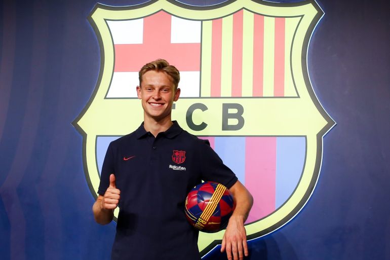 BARCELONA, SPAIN - JULY 04: New Barcelona signing Frenkie de Jong poses for the media as he is unveiled at FC Barcelona store on July 04, 2019 in Barcelona, Spain. (Photo by Eric Alonso/Getty Images)