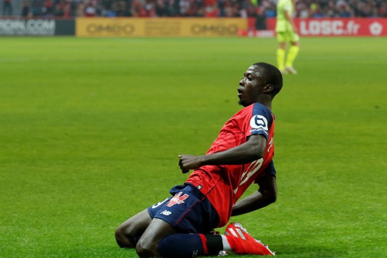 Soccer Football - Ligue 1 - Lille v Angers - Stade Pierre-Mauroy, Lille, France - May 18, 2019 Lille's Nicolas Pepe celebrates scoring their second goal REUTERS/Pascal Rossignol